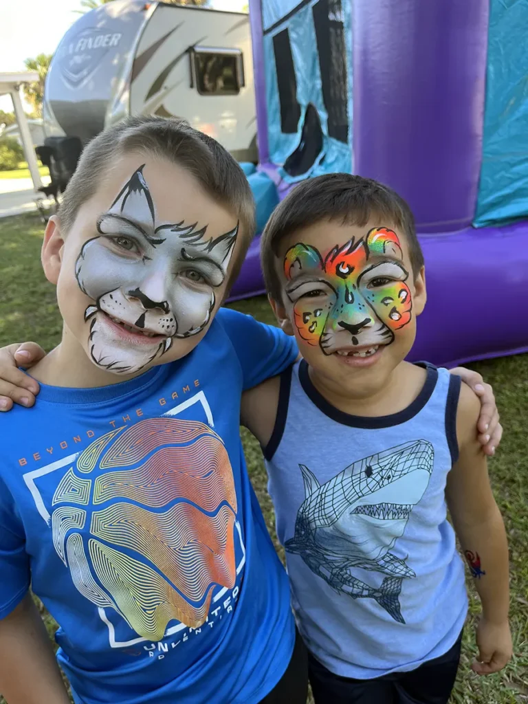 Wolf and Rainbow Cheetah (Heather Paints Fort Myers Face Painter for Parties in Cape Coral Childrens Face Painting Corporate Events Naples Face Paint Estero Lehigh Acres)